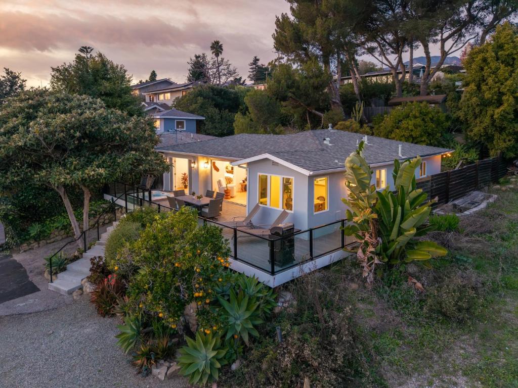 an aerial view of a home at dusk at Summerland SeaSpa Retreat | The Chosen Collection in Summerland