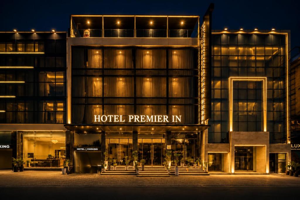 a hotel premier ni is lit up at night at Airport Premier In With Free Airport Drop in New Delhi