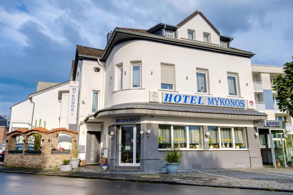 a hotel in front of a building at Hotel Mykonos in Eschweiler