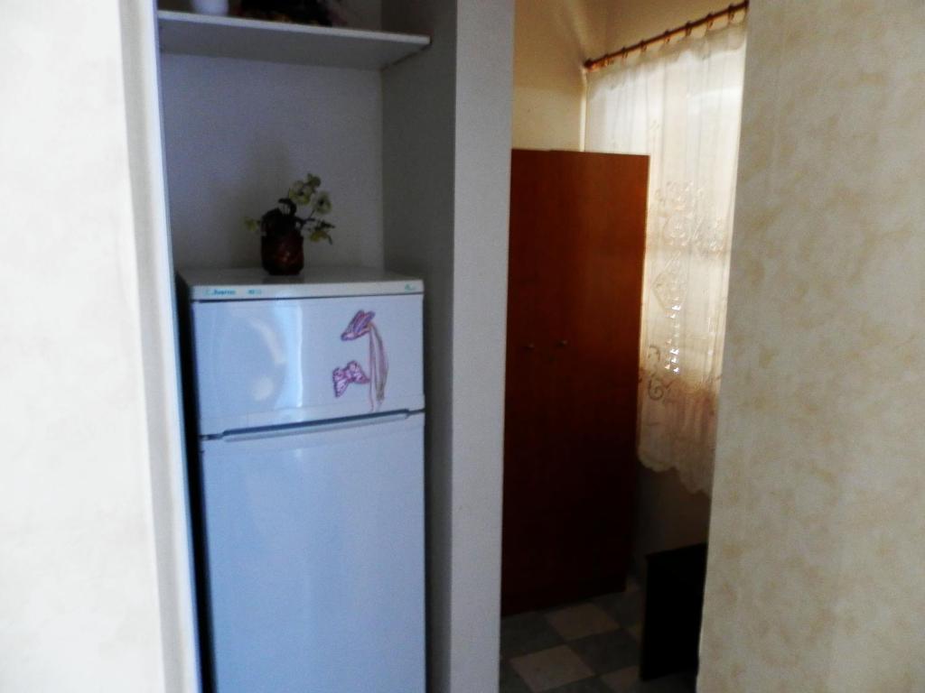 A kitchen or kitchenette at Akanthos Hotel