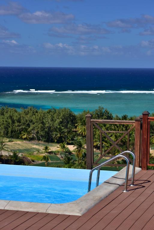 a swimming pool with a view of the ocean at Le Marin, Rodrigues Island in Rodrigues Island