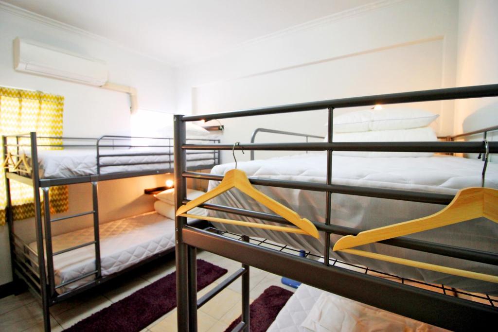 Voodi või voodid majutusasutuse Navel Orange Hostel toas