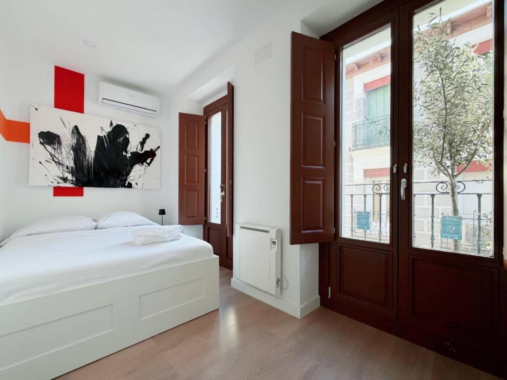 K - Habitación acogedora en Lavapiés vive Madrid