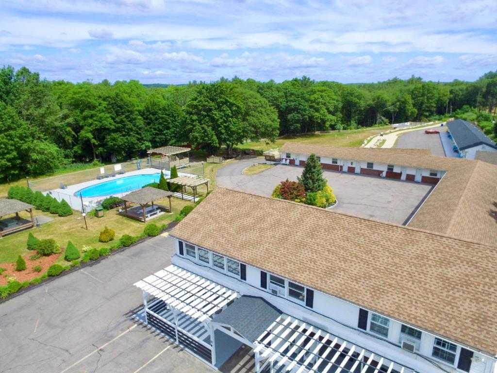an aerial view of a house with a swimming pool at Aquastar Inn in Westerly
