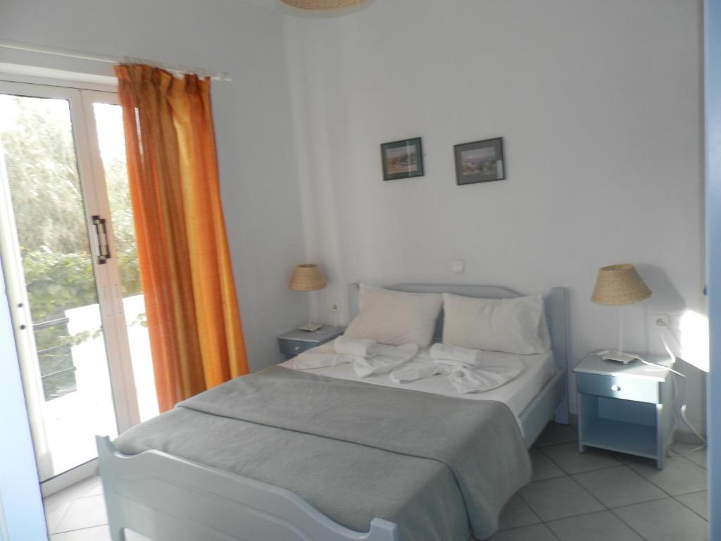 Postel nebo postele na pokoji v ubytování Silvi Mari Apartments