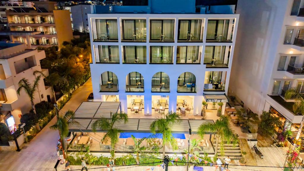 an overhead view of a building at night at Colosseum Hotel in Ksamil