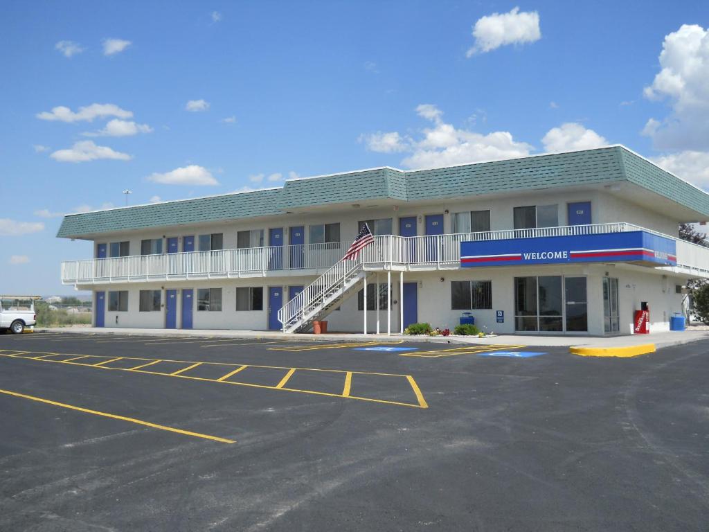 a parking lot in front of a hotel at Motel 6-Laramie, WY in Laramie