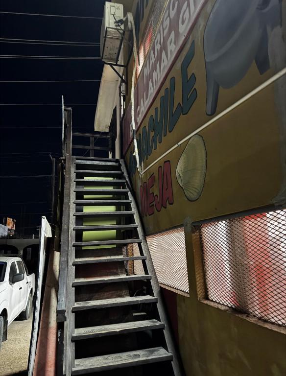 a set of stairs leading up to a ballpark at Departamento Kassandra in Puerto Peñasco