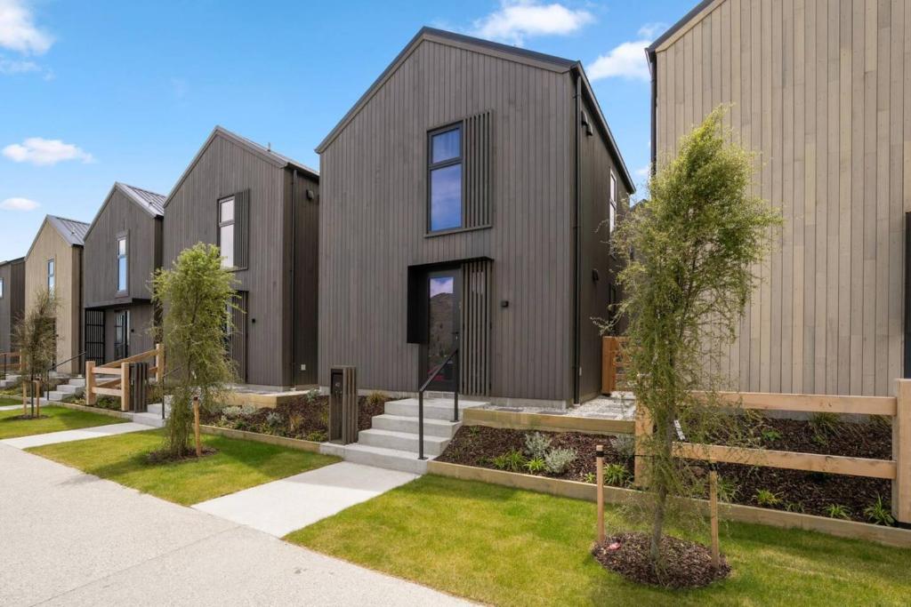 a row of houses in a row at Ski Villa with Carpark 40, Stylish Alpine Base in Queenstown
