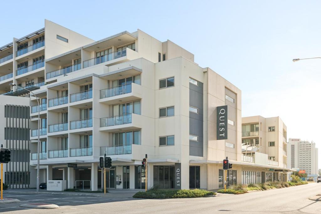 an apartment building on the corner of a street at Quest Scarborough in Perth