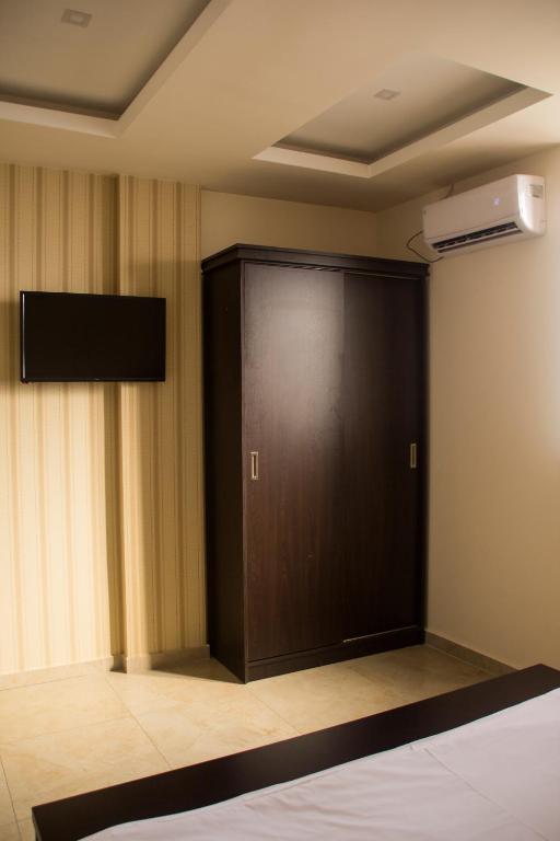 TV a/nebo společenská místnost v ubytování Mirage Hotel