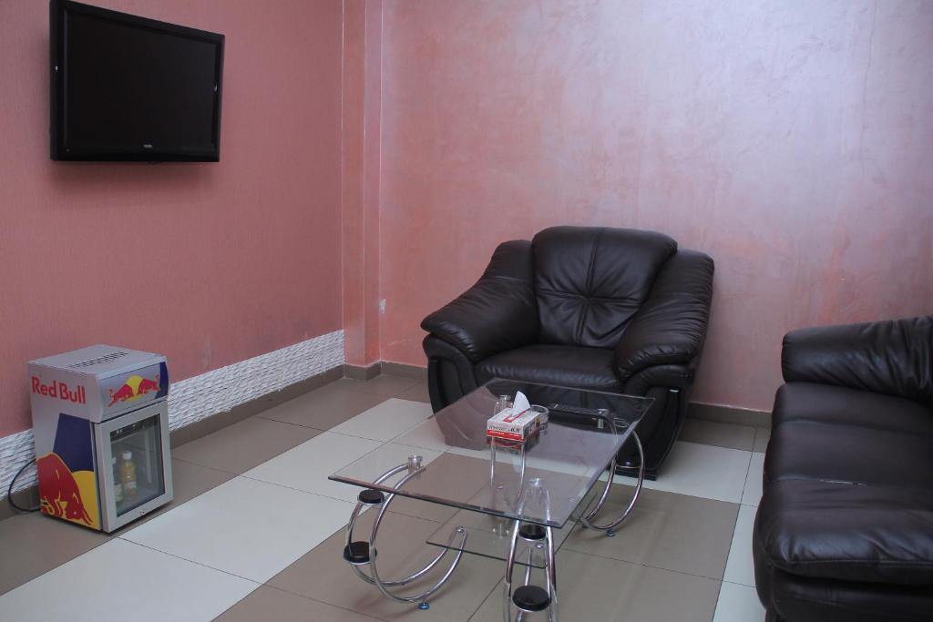 TV a/nebo společenská místnost v ubytování Mirage Hotel