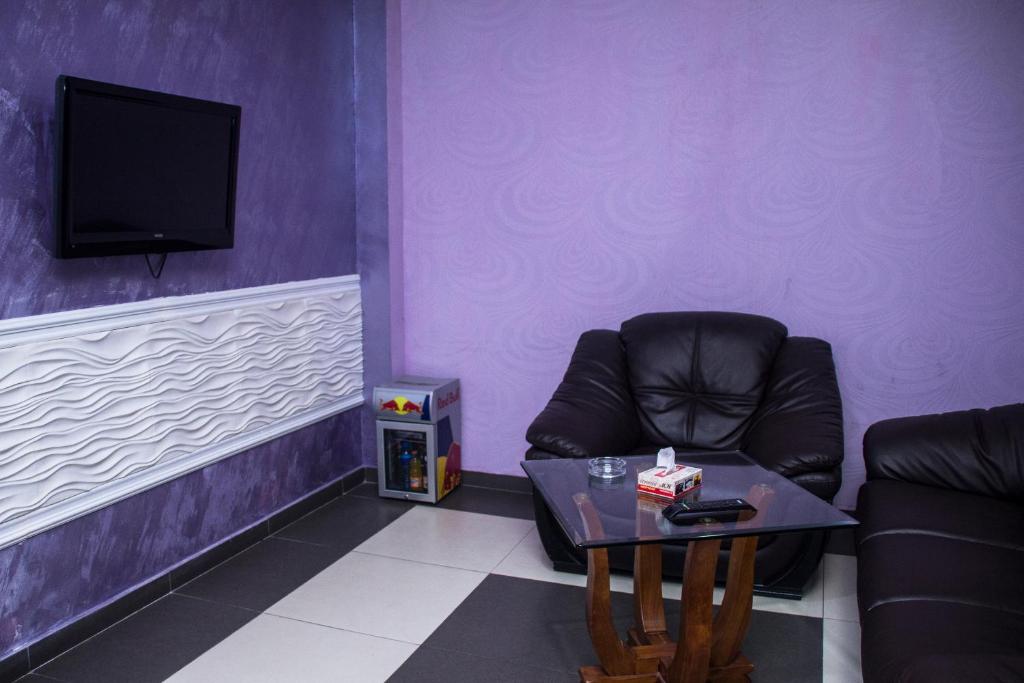 TV a/nebo společenská místnost v ubytování Mirage Hotel