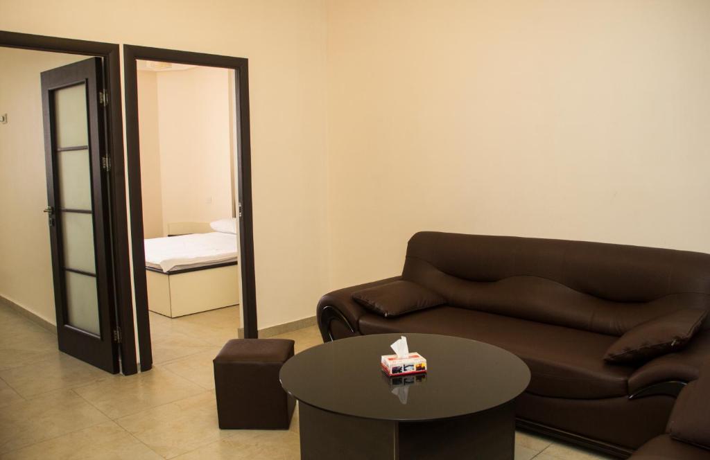 Postel nebo postele na pokoji v ubytování Mirage Hotel
