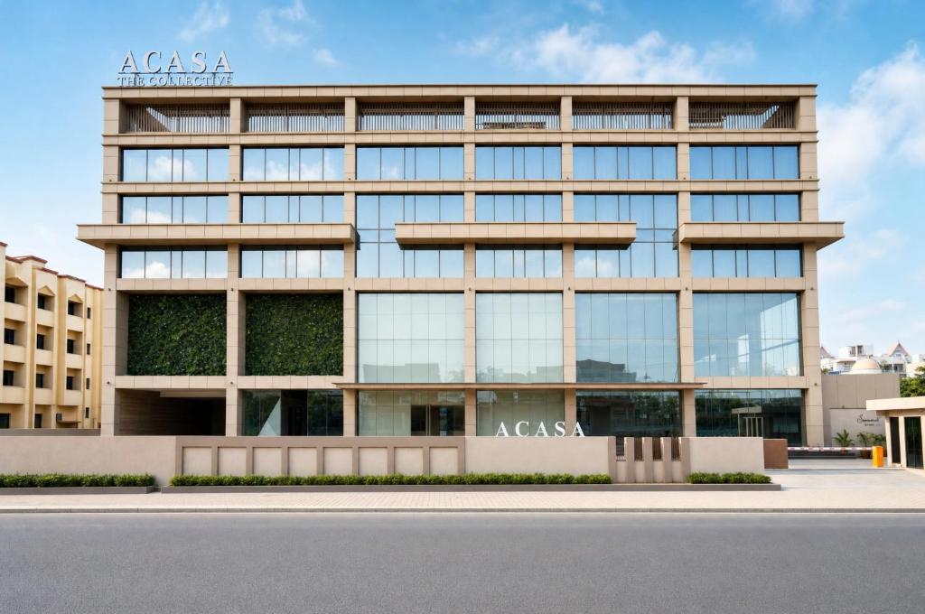 an office building with aaaaa sign on the facade at ACASA Collective in Aurangabad