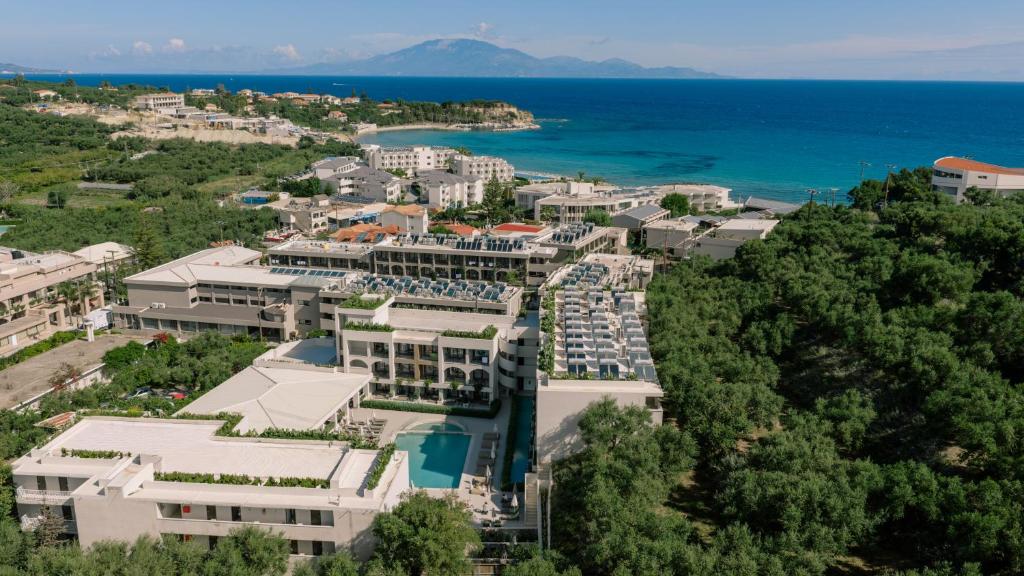 an aerial view of a resort next to the ocean at Planos Deluxe in Zakynthos