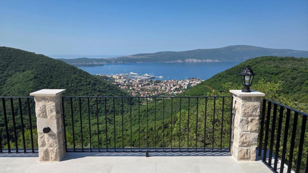 a balcony with a view of a body of water at Casa Di Lukovic II in Tivat