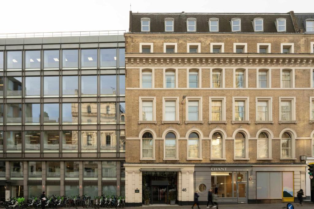 a group of buildings next to each other at COVE Cannon Street in London