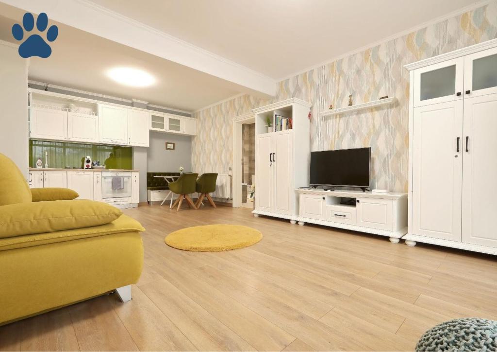 Televizorius ir (arba) pramogų centras apgyvendinimo įstaigoje Olivia Studio