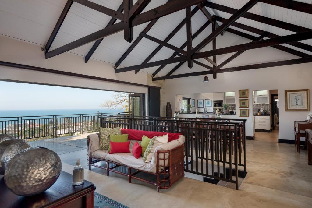 a living room with a view of the ocean at Stella Road 24 in Ballito