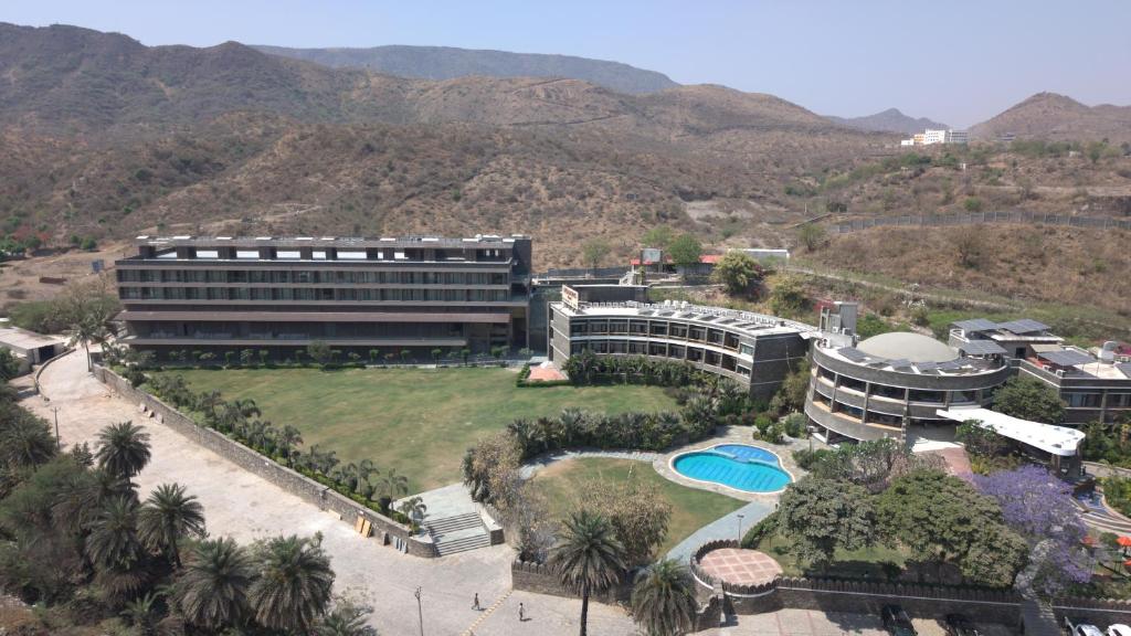 an aerial view of a building with a resort at Seasons Park Resort in Udaipur