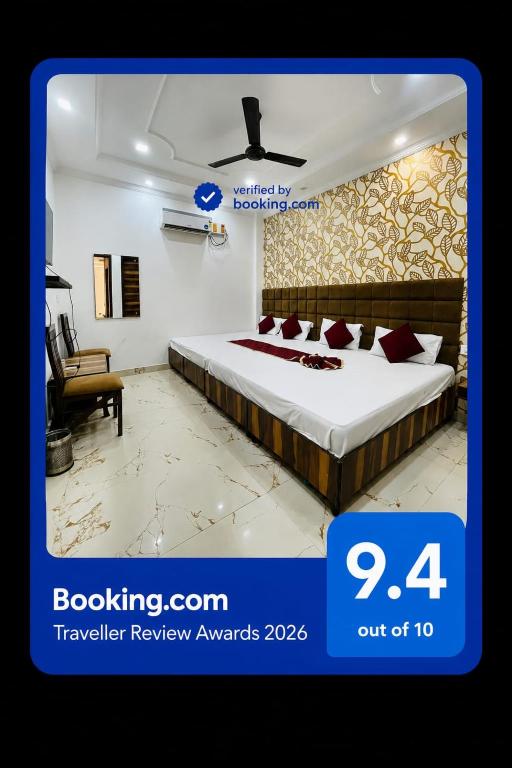 a poster of a hotel room with a bed at Hotel Embassy In - 200 Mtrs - Near Golden Temple in Amritsar