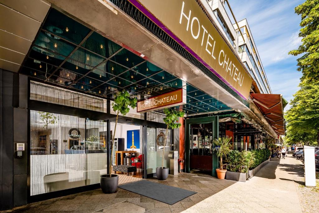 a store front of a street with plants in front at Hotel Chateau Berlin Kurfürstendamm in Berlin