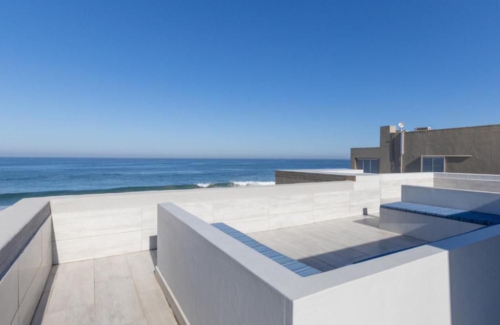 a building with a view of the ocean at Vallen Lodge 2 in Ballito
