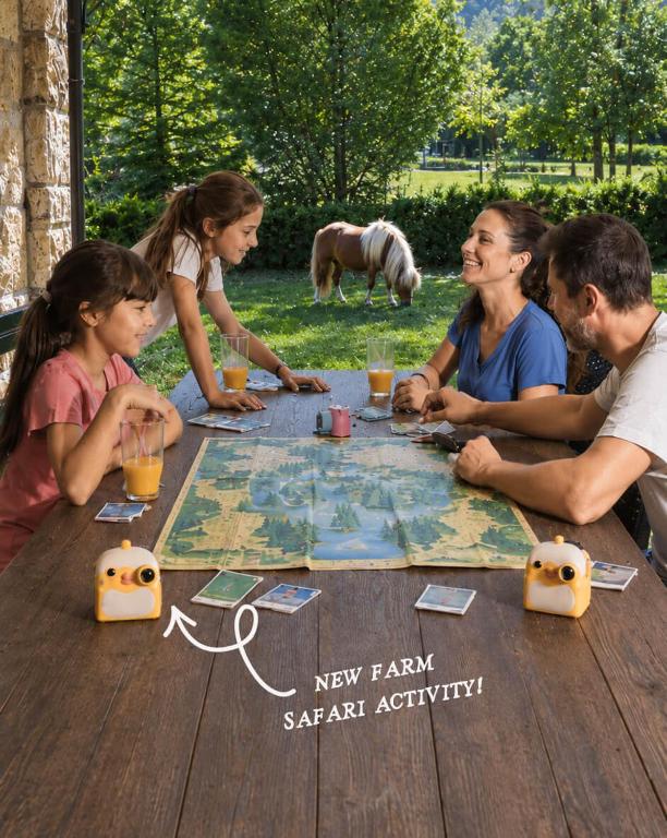 a group of people sitting around a table playing a board game at Ninemia Stay and Play in Karpenisi
