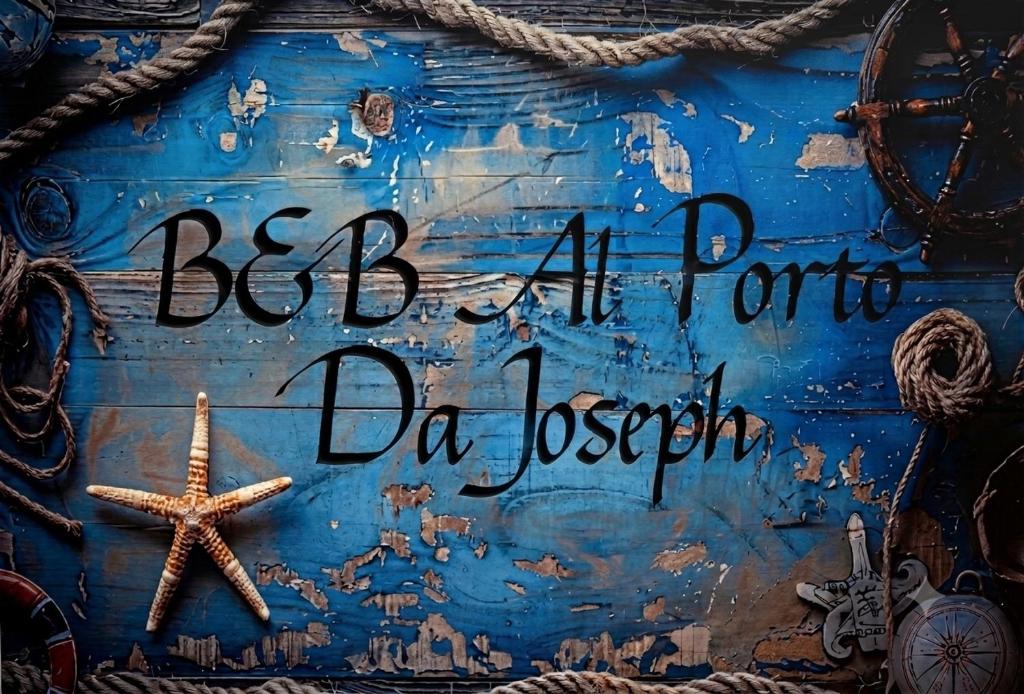 a sign that says bajaport de jeston on a wall at Beb al porto da joseph in Trapani