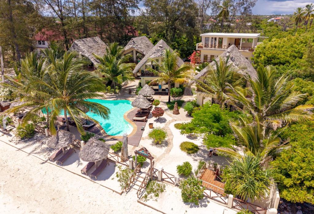 an aerial view of a resort with a swimming pool at Clove Island Villas & Spa in Makunduchi