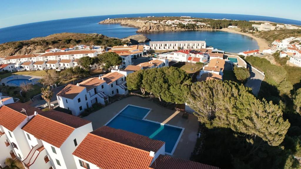 an aerial view of a villa with a resort at Complejo turístico Menorca SOL ISLA in Arenal d'en Castell