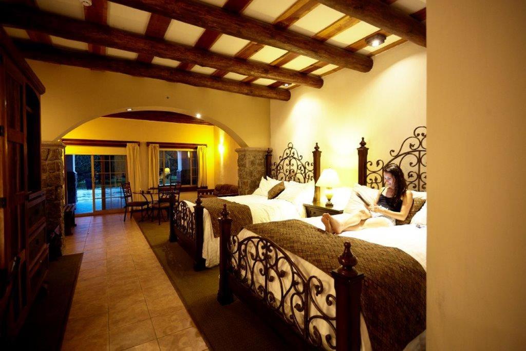 Cama o camas de una habitación en Hotel Quinta Mision