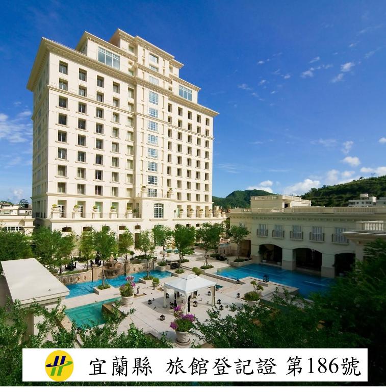 a hotel with a large building and a pool at RSL Cold & Hot Springs Resort Suao in Suao