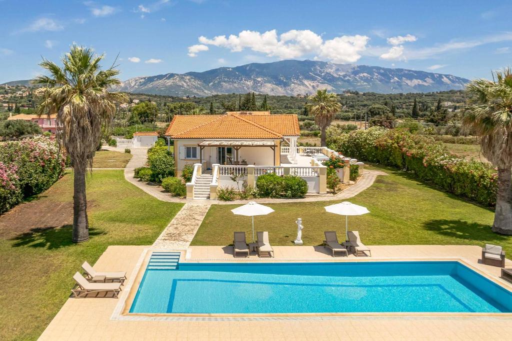 an aerial view of a villa with a swimming pool at Villa Polymnia in Kaligata