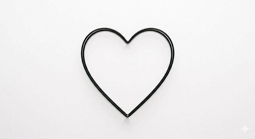 a black heart icon on a white background at A place for the soul in Kibbutz Snir