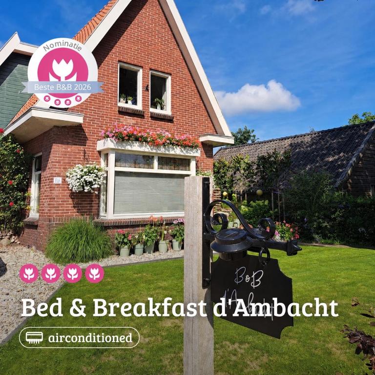 a bed and breakfast sign in front of a house at Bed & Breakfast - appartement d'Ambacht in Borger