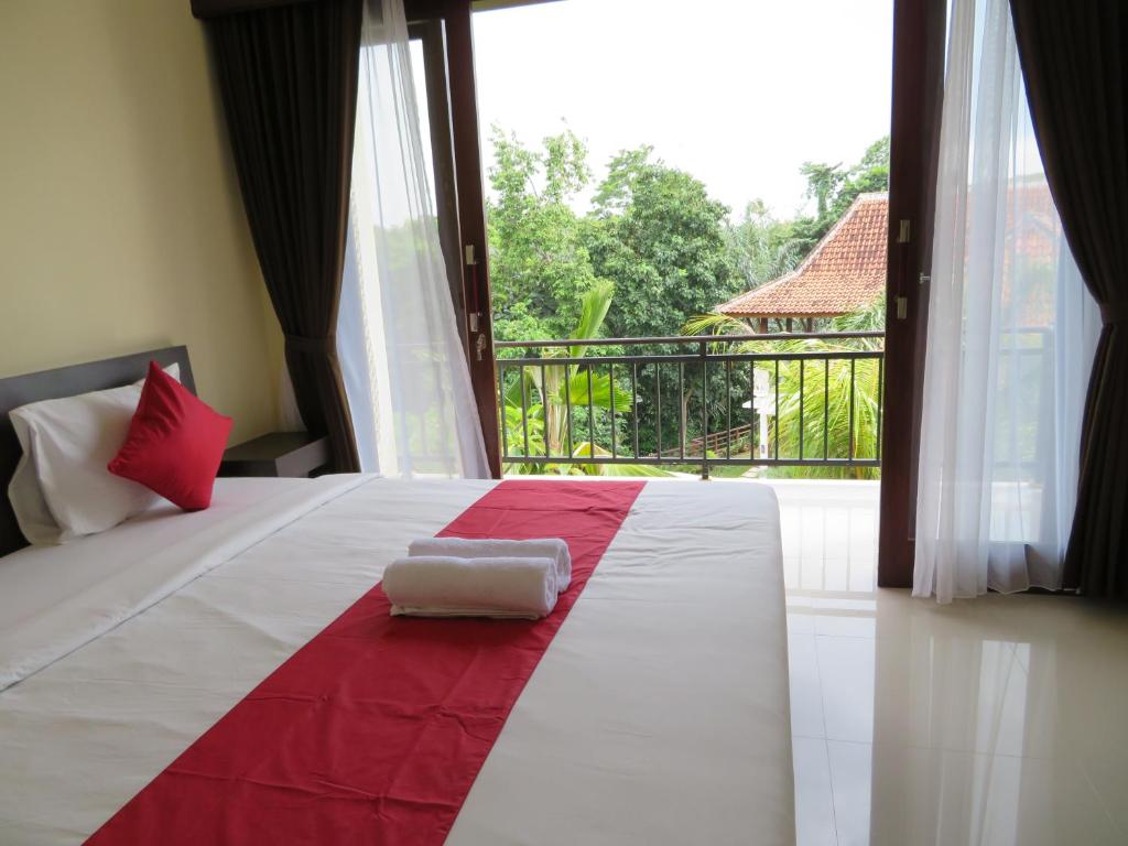Letto o letti in una camera di Odah Ayu Guest House