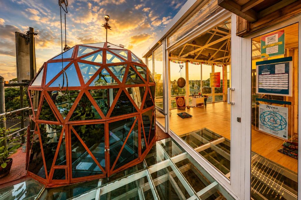 a room with a glass orb on top of a building at Mandala Yoga Hostel in Bogotá