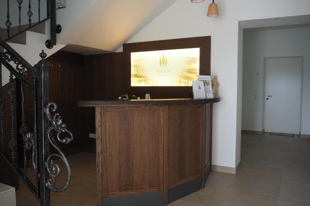 Kuchyň nebo kuchyňský kout v ubytování Mattone Aparthotel