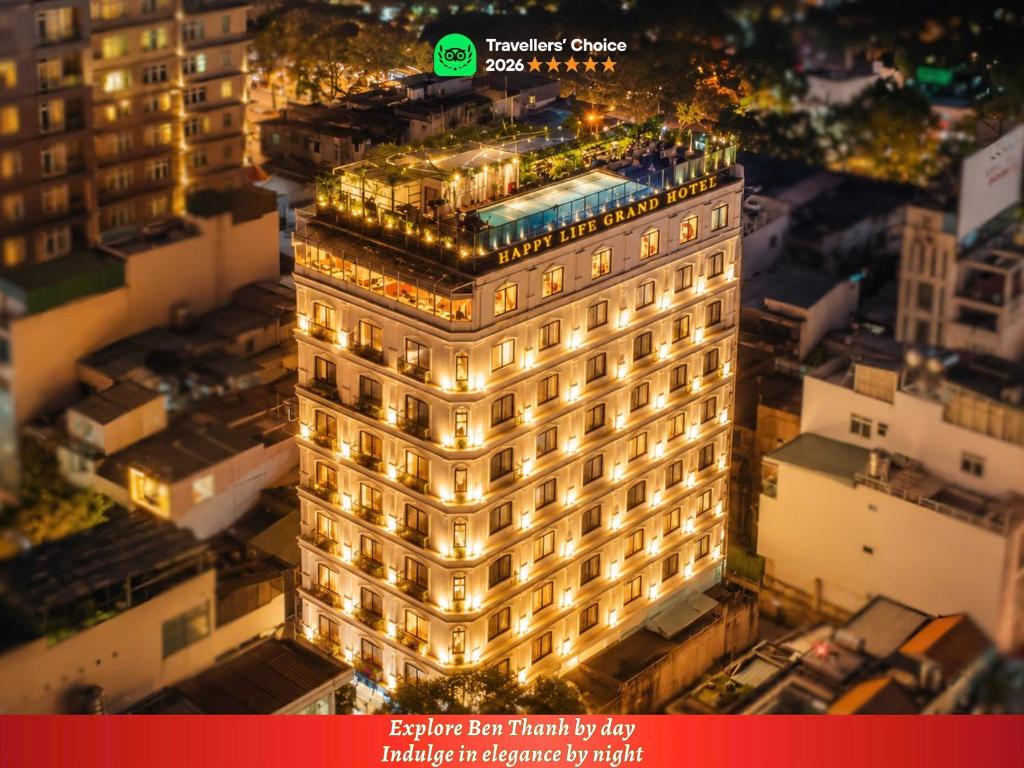 an overhead view of a building with lights on it at Happy Life Grand Hotel & Rooftop Skybar in Ho Chi Minh City