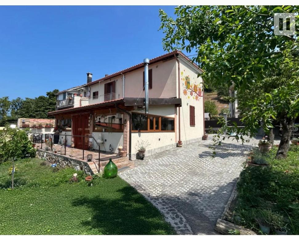 a large house with a garden in front of it at Ramoscello in Altare
