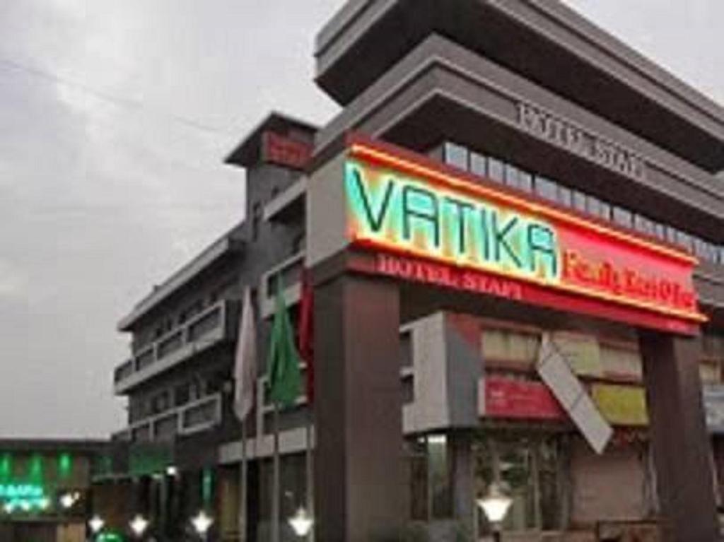 a building with a valkyrie sign in front of it at Hotel Stafi in Pune