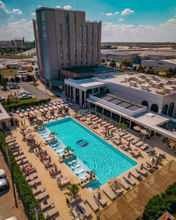an aerial view of a resort with a swimming pool at ibis Styles Arad in Arad