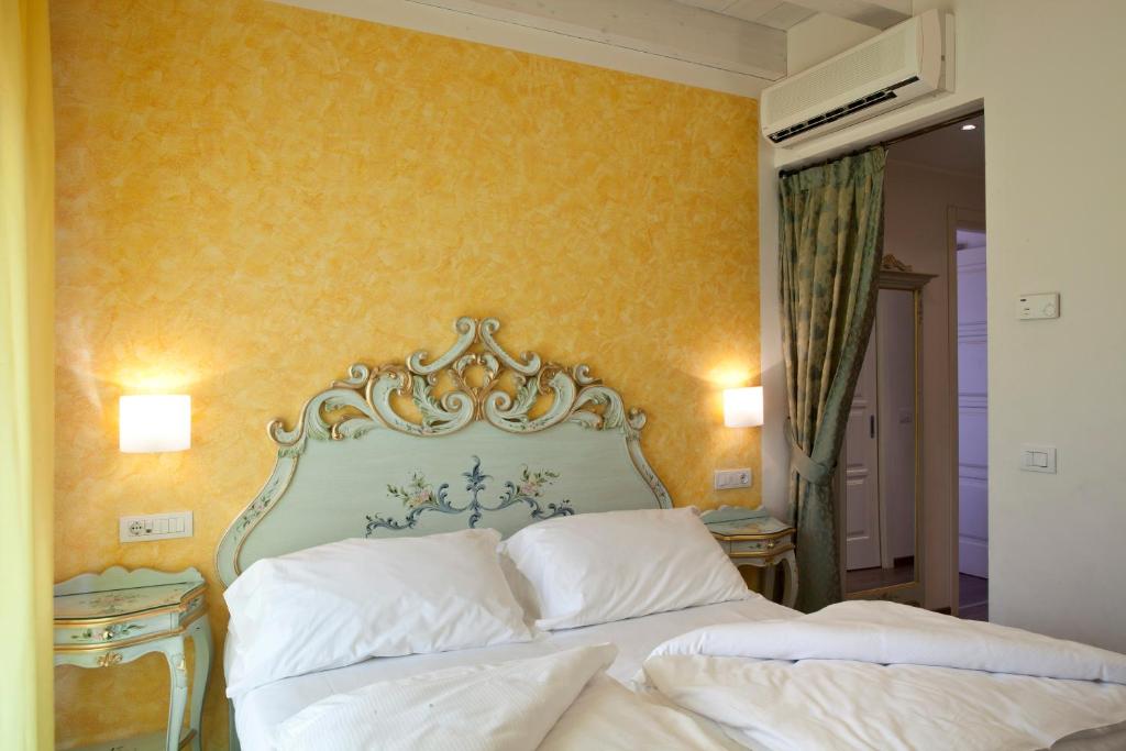 Postel nebo postele na pokoji v ubytování Hotel Pai