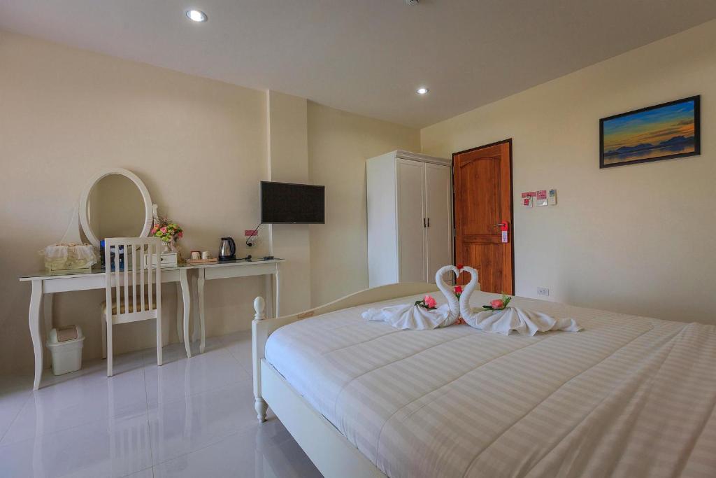 TV a/nebo společenská místnost v ubytování JS Residence Krabi