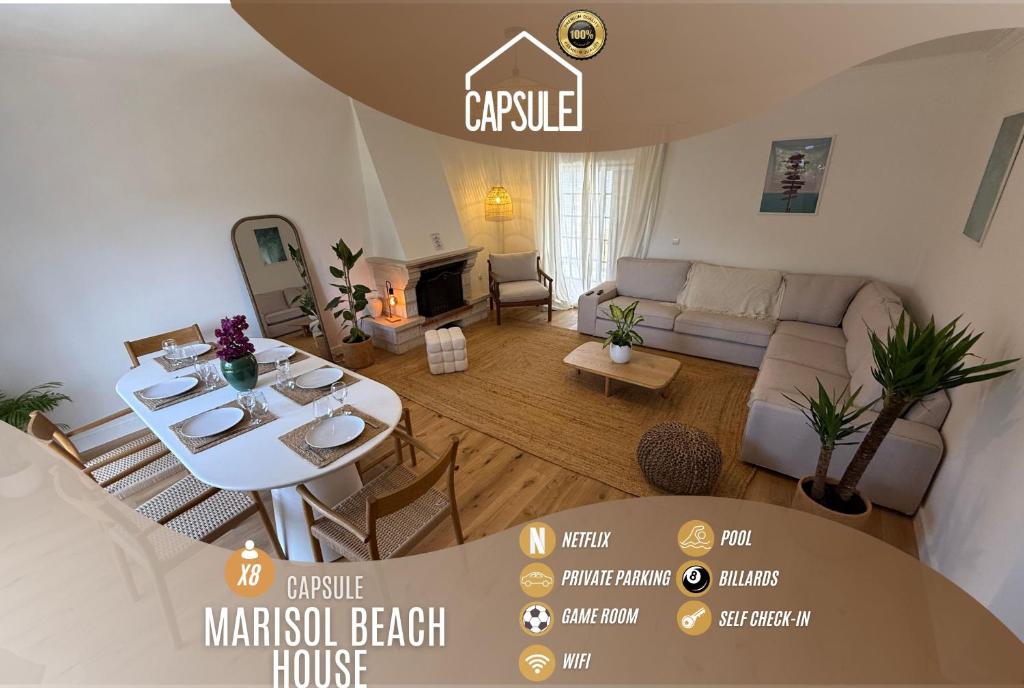 an aerial view of a living room with a table and a couch at Capsule Marisol Family Retreat in Corroios