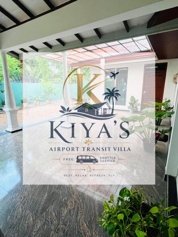 a sign for the kyrks airport transfer villa at Airport Kiyas Transit Villa Free Airport Pickup or Drop in Katunayaka