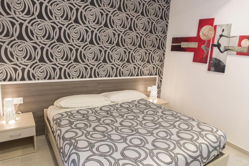 Posteľ alebo postele v izbe v ubytovaní Metronia Guest House