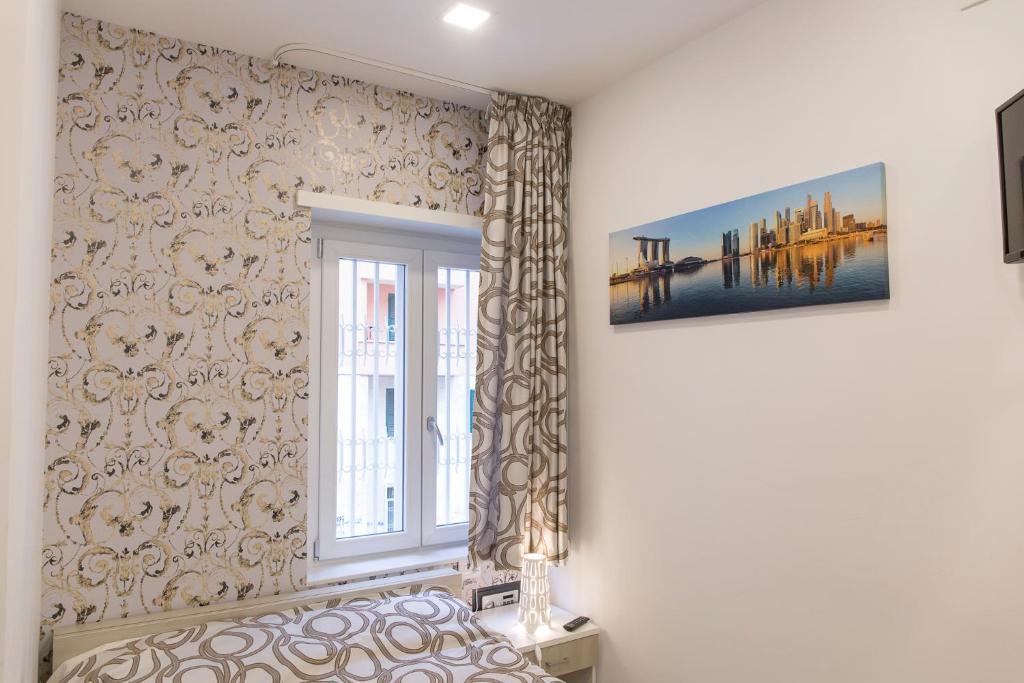Posteľ alebo postele v izbe v ubytovaní Metronia Guest House